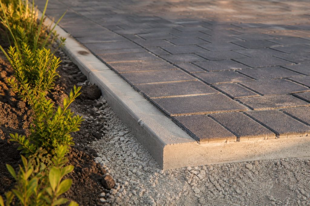 Edge Restraints: The Small Detail That Stops Your Paving Spreading